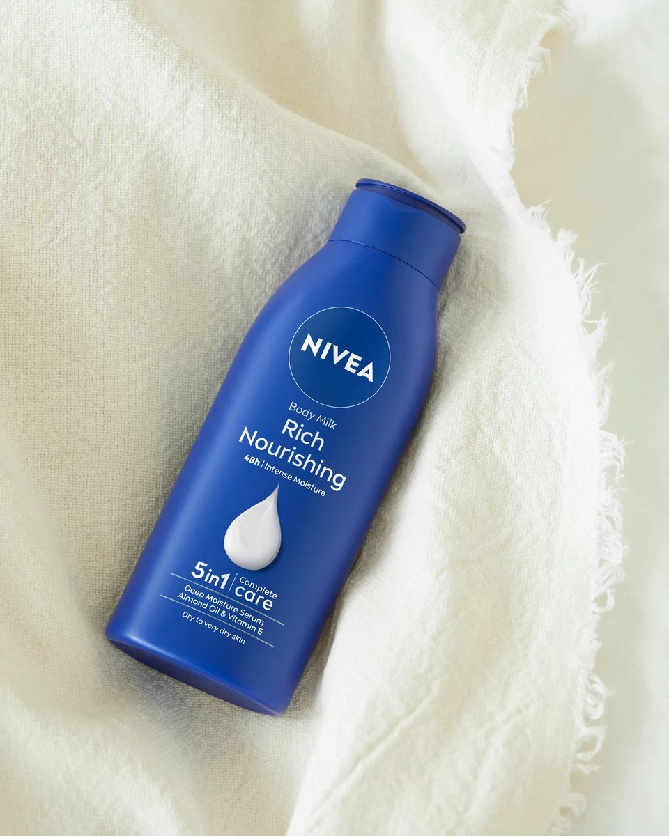 NIVEA Verzorgende Bodymilk - 400 Ml 4 NIVEA Verzorgende Bodymilk - 400 Ml - Afbeelding 4